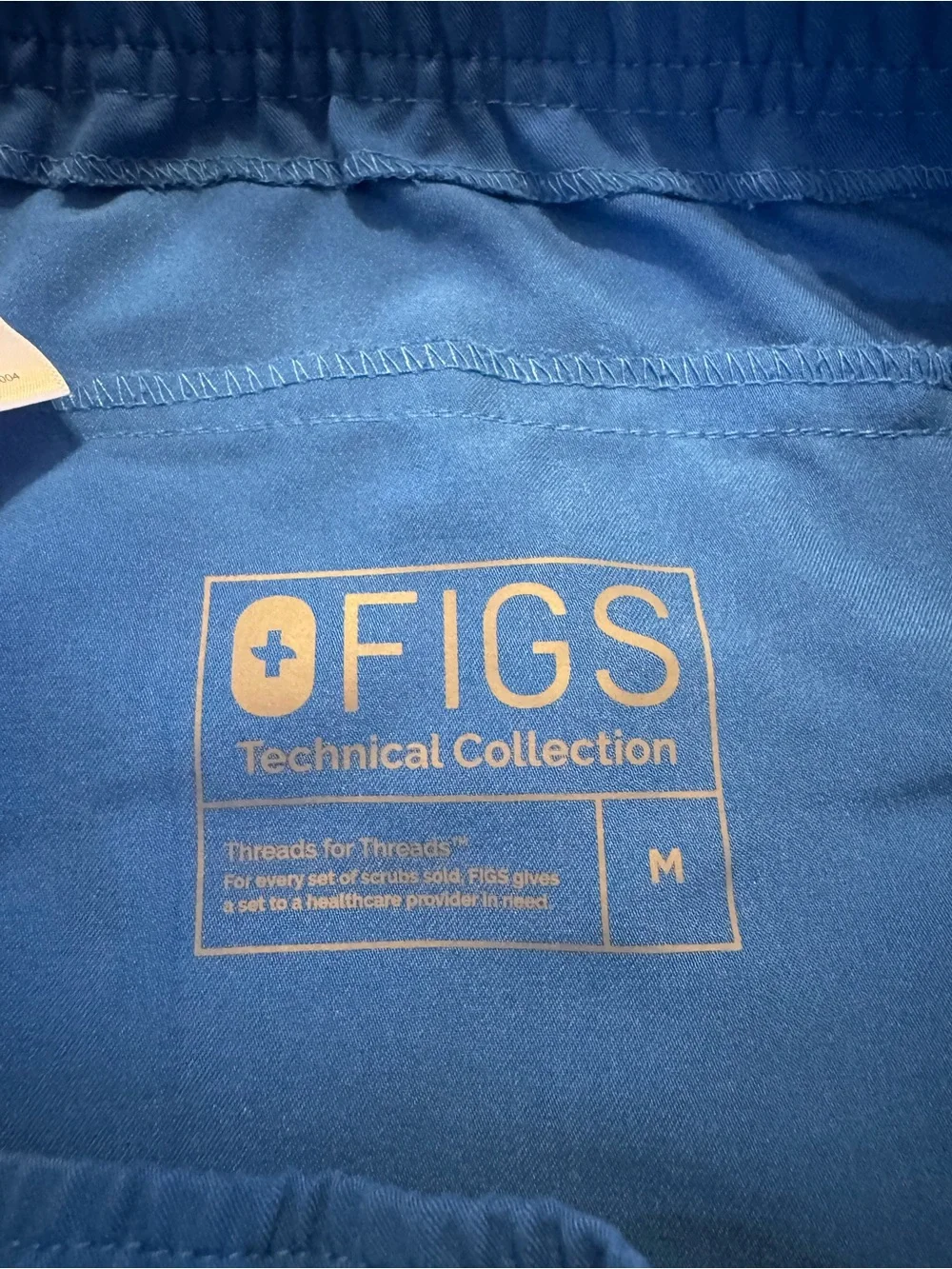 Men's FIGS royal blue jogger scrub pants, elastic waistband multiple pockets, M.